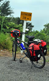 Bike and Elevation Sign, SH35 coastal road from Opotiki to Te Kaha - Photographer: Roy Sinclair