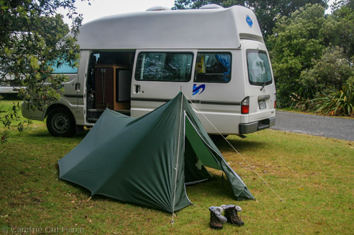 Backpacker tent and campervan camping West Coast, South Island, New Zealand