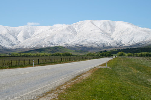 Road trip through snow capped Central Otago Dunstan Mountains, South Island, New Zealand