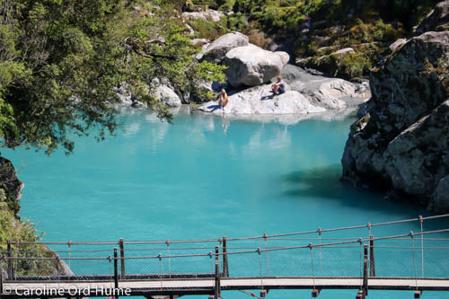 Turquoise Water of Hokitika River and the Swing Bridge Over the Gorge, West Coast, New Zealand
